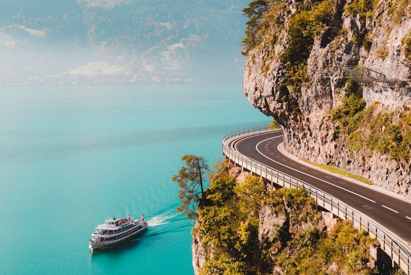 yacht sailing near island during daytime